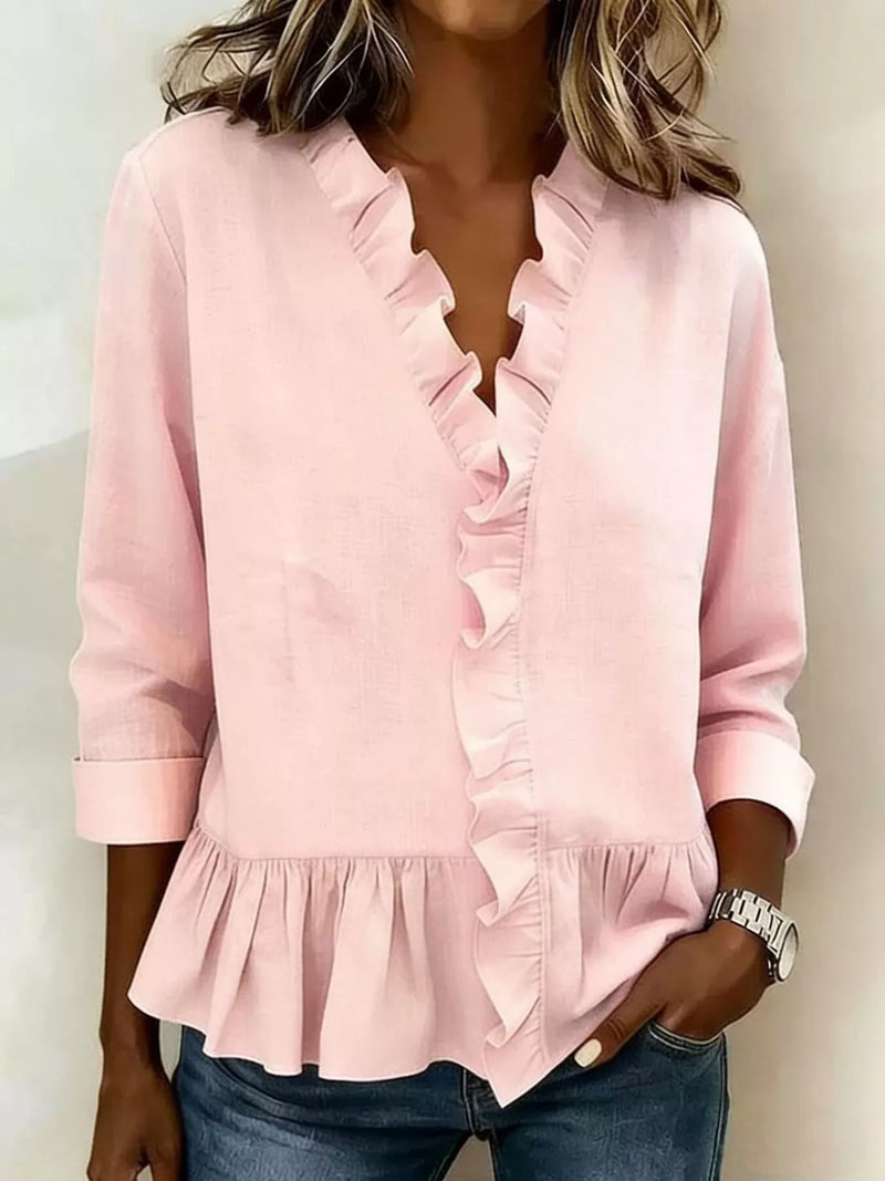 V-ringad blus med peplum