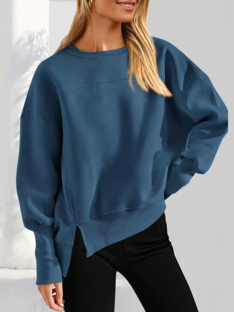 Ledigt sittande sweatshirt med slits