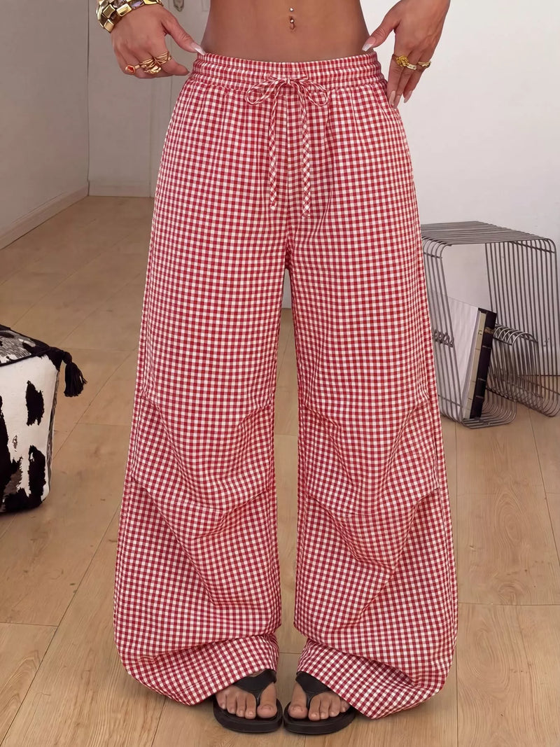 Rutiga vida byxor med hög midja och dragsko