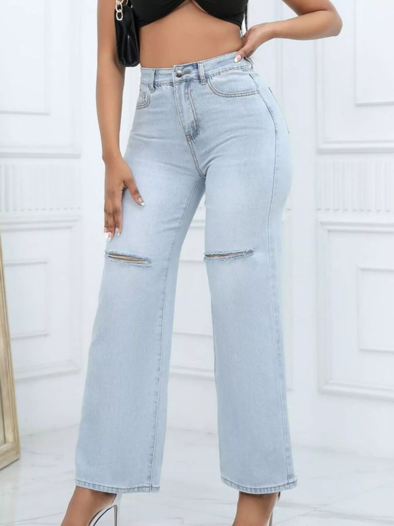 Vida jeans med knappstängning och slitna detaljer