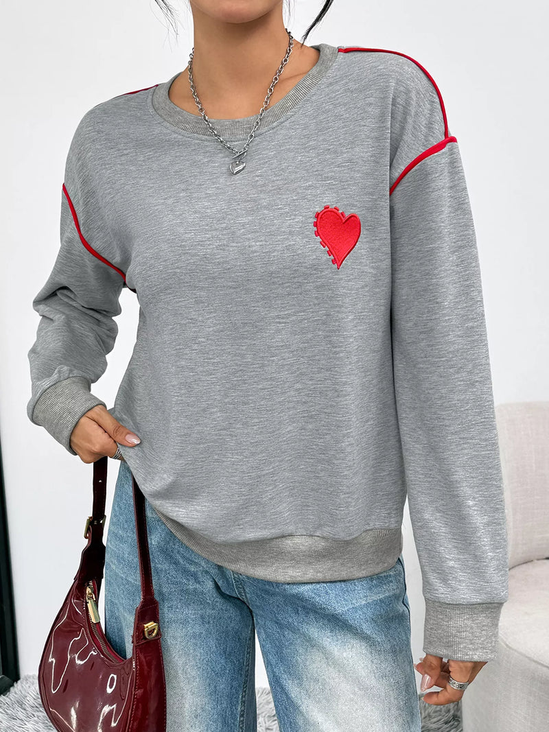 Sweatshirt med hjärtmotiv och rund halsringning