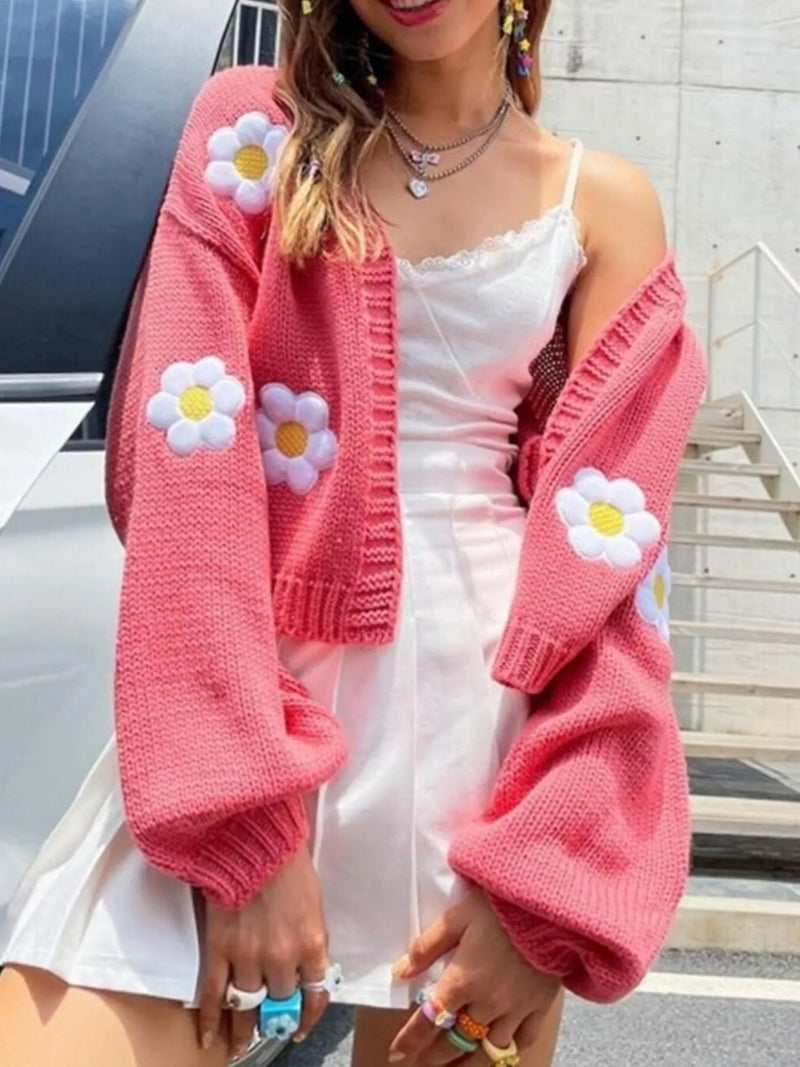 Blommig cardigan med öppen modell