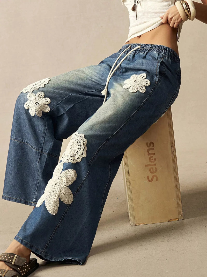 Vida jeans med dragsko och applikation