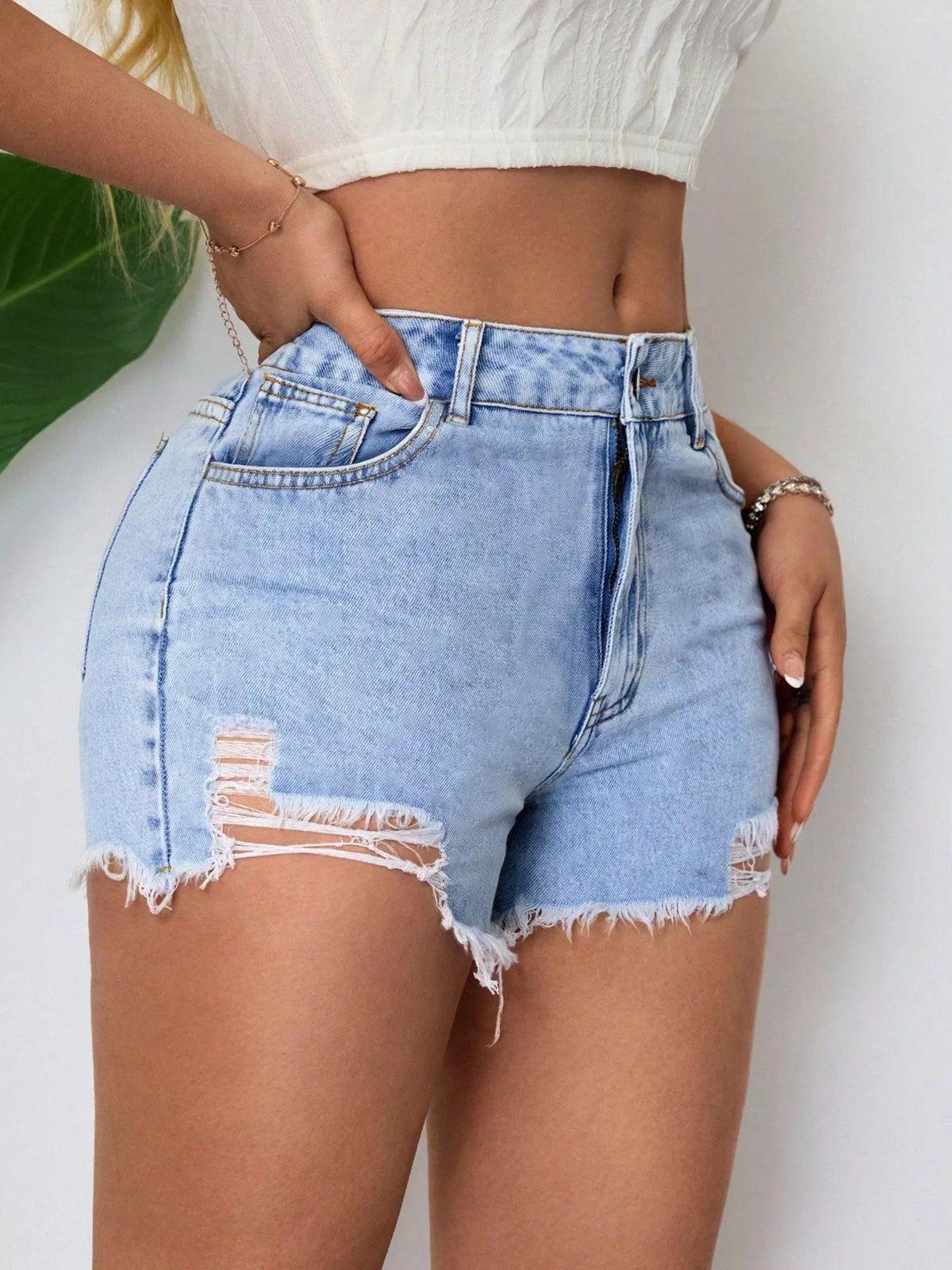 Shorts i denim med rå kant – bild 3