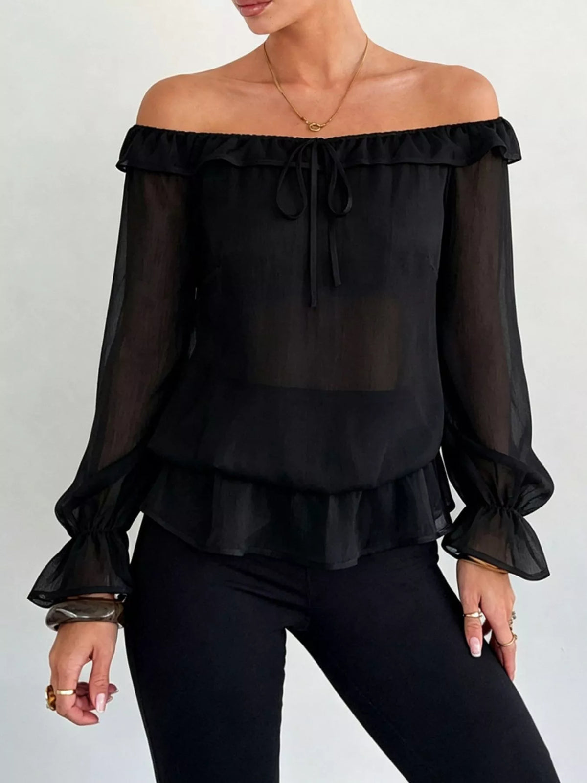 Blus i chiffong med peplum