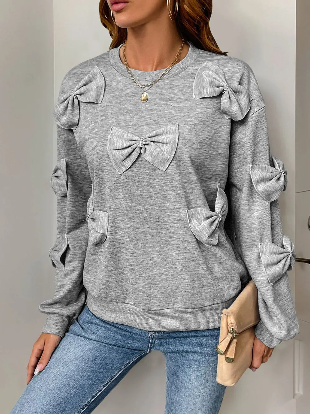Långärmad sweatshirt med rund halsringning och rosett – bild 3
