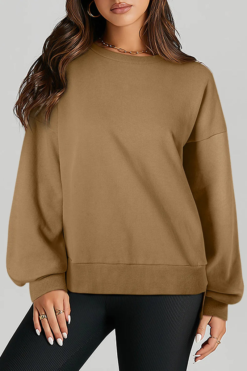 Långärmad sweatshirt med rund halsringning och asymmetrisk nederkant