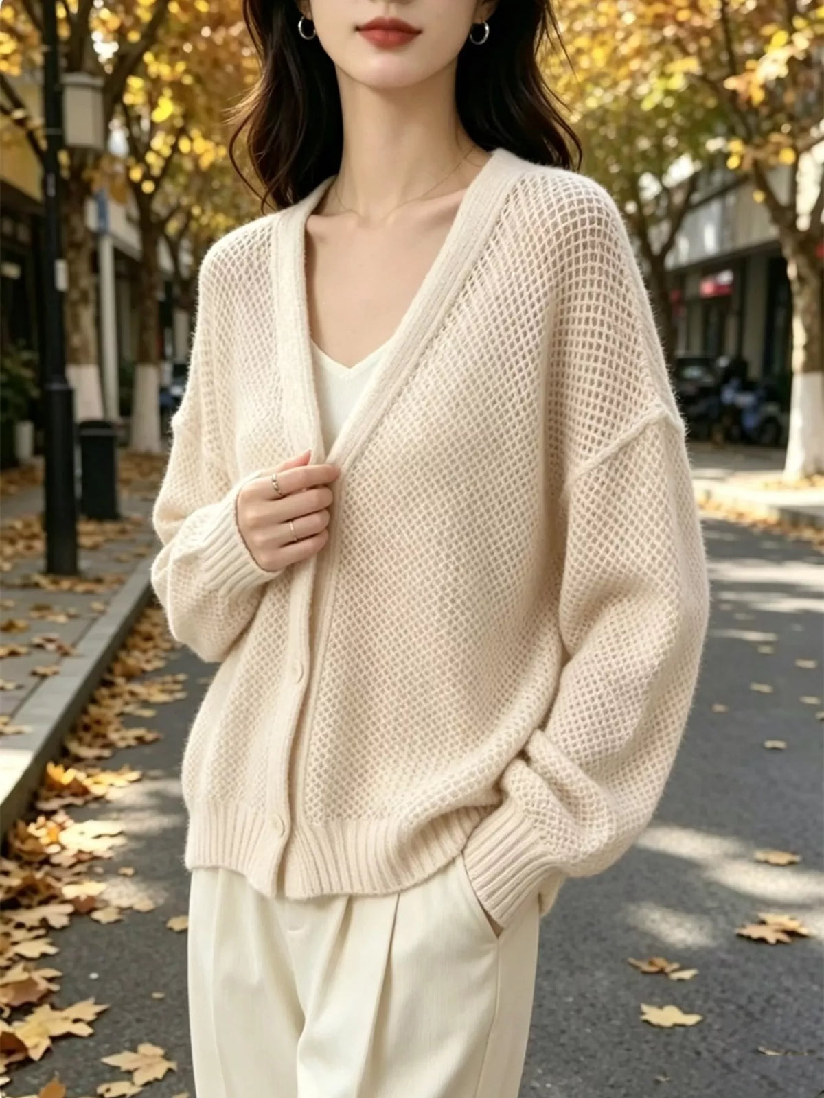 Hålstickad cardigan – bild 8
