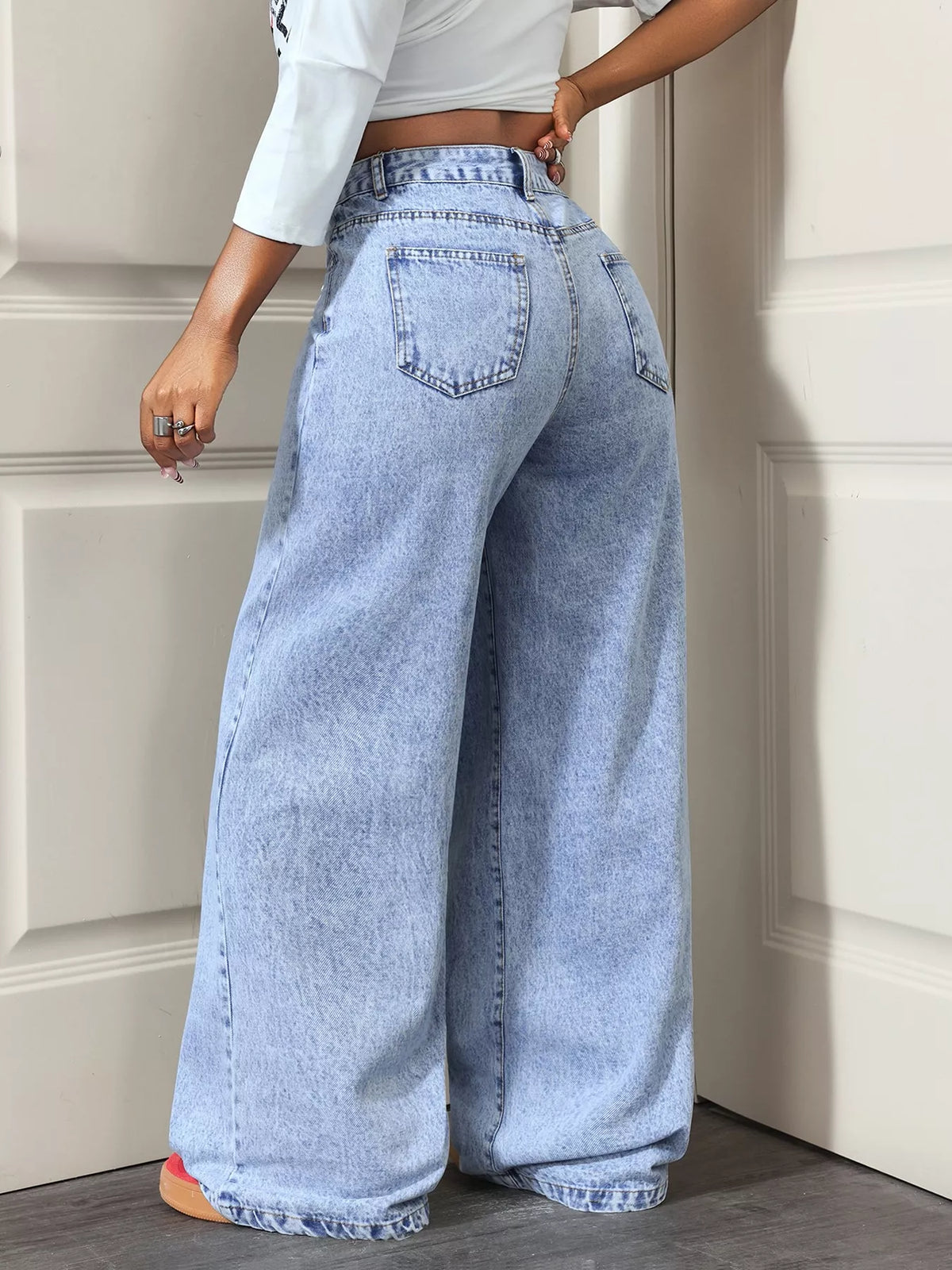 Asymmetriska jeans med omlott – bild 5