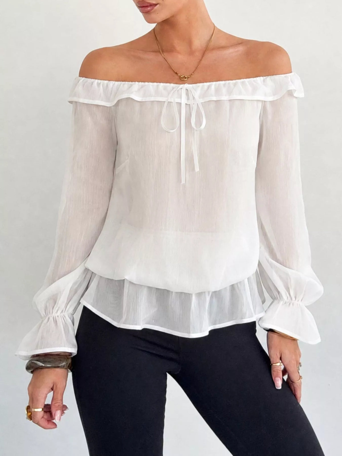 Blus i chiffong med peplum – bild 8