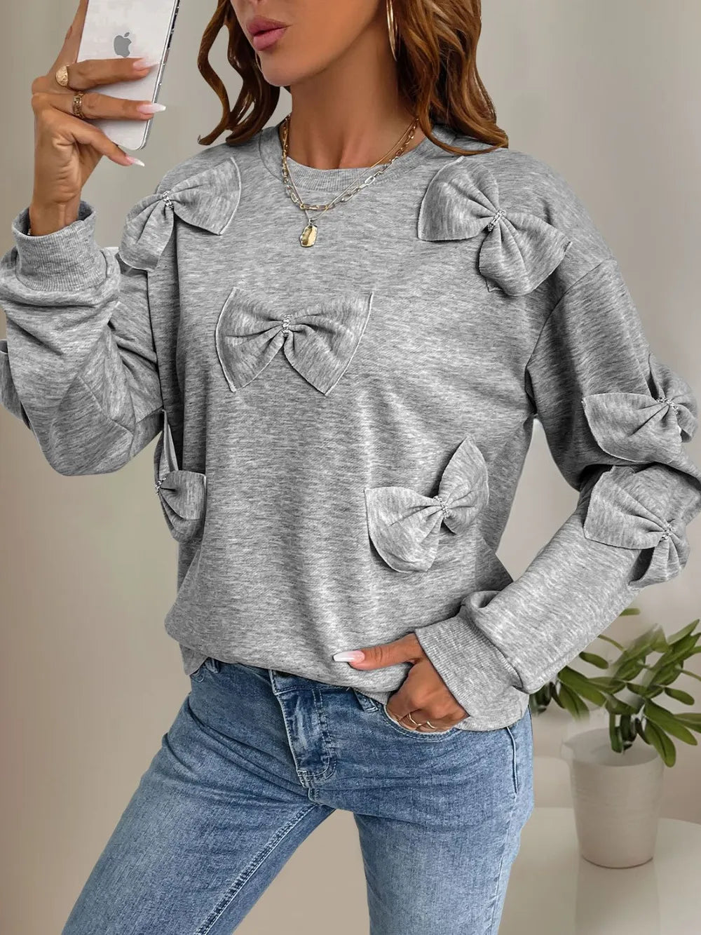 Långärmad sweatshirt med rund halsringning och rosett – bild 5