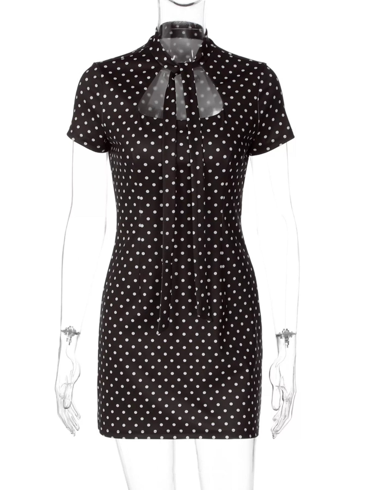 Prickig miniklänning med cut out-detalj – bild 12