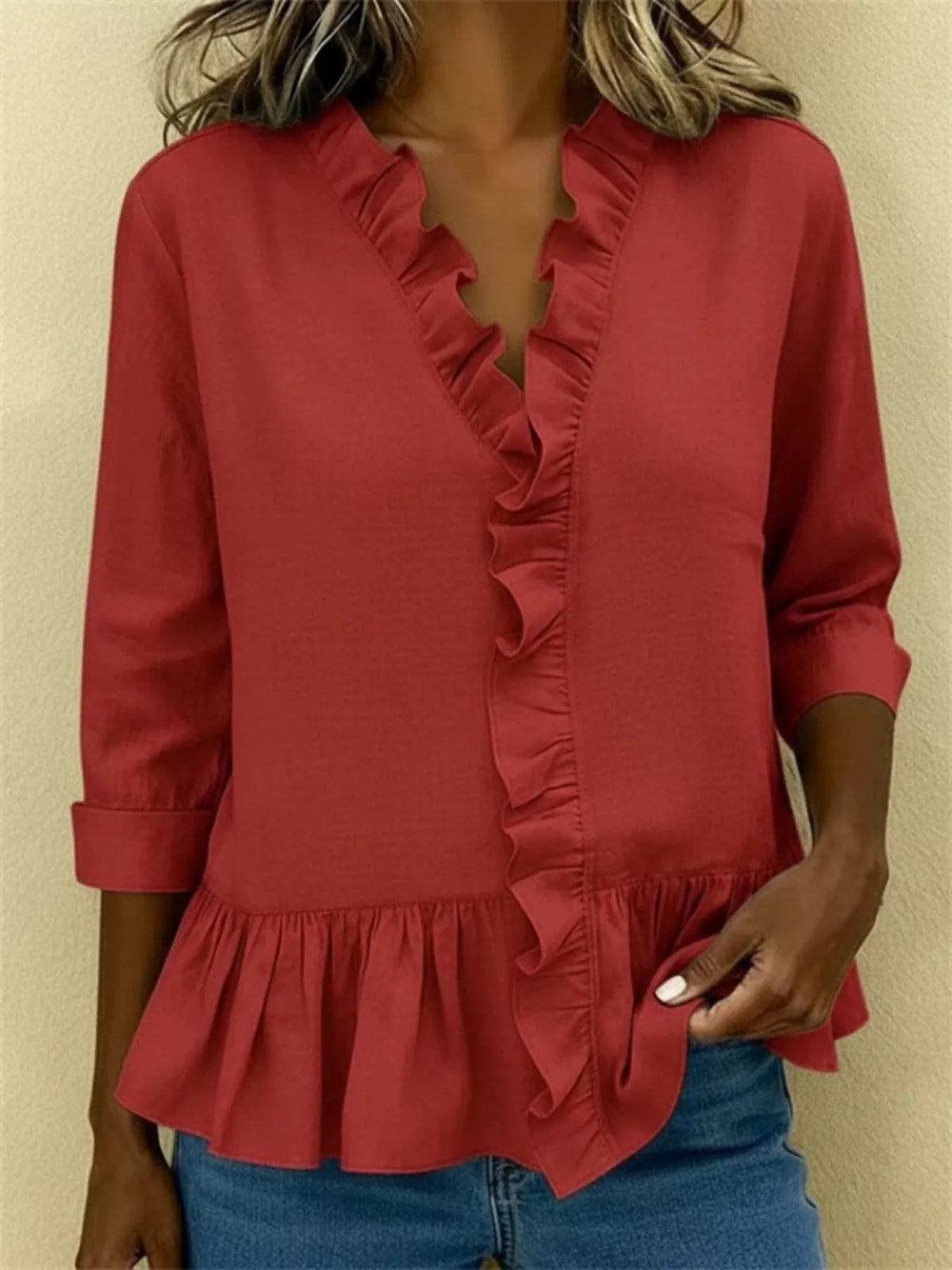 V-ringad blus med peplum – bild 14