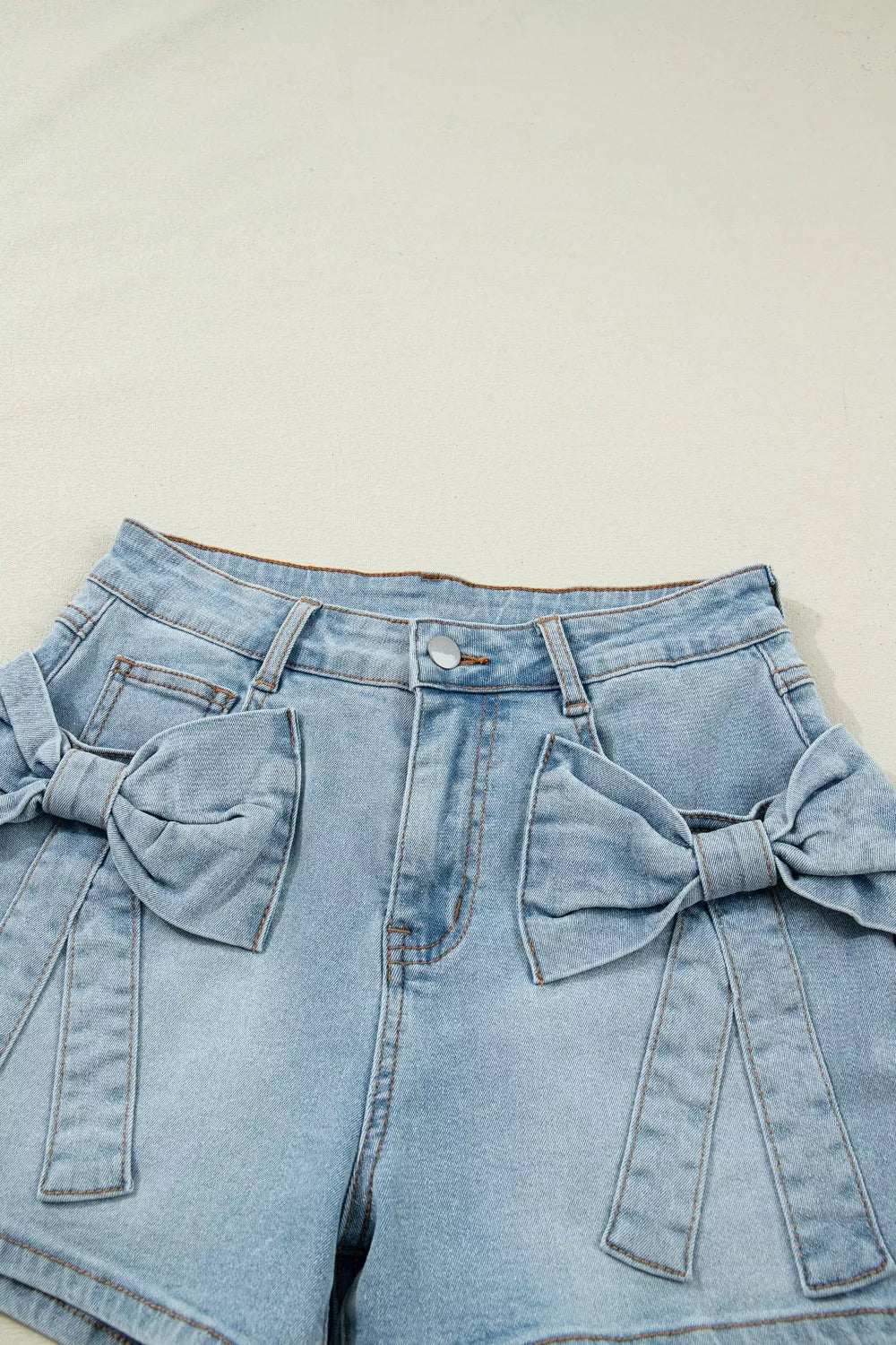 Shorts i denim med rosett – bild 6