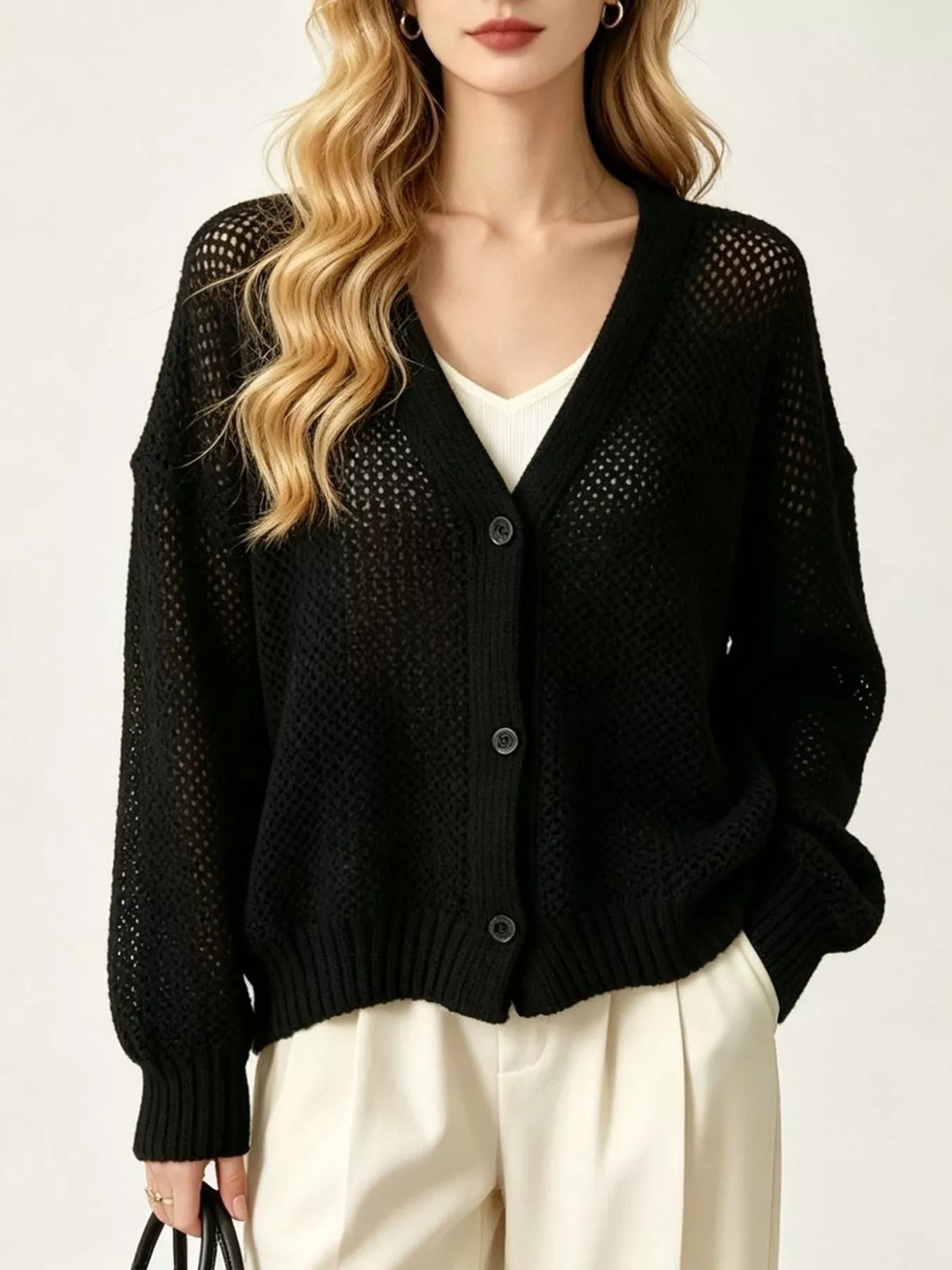 Hålstickad cardigan – bild 13