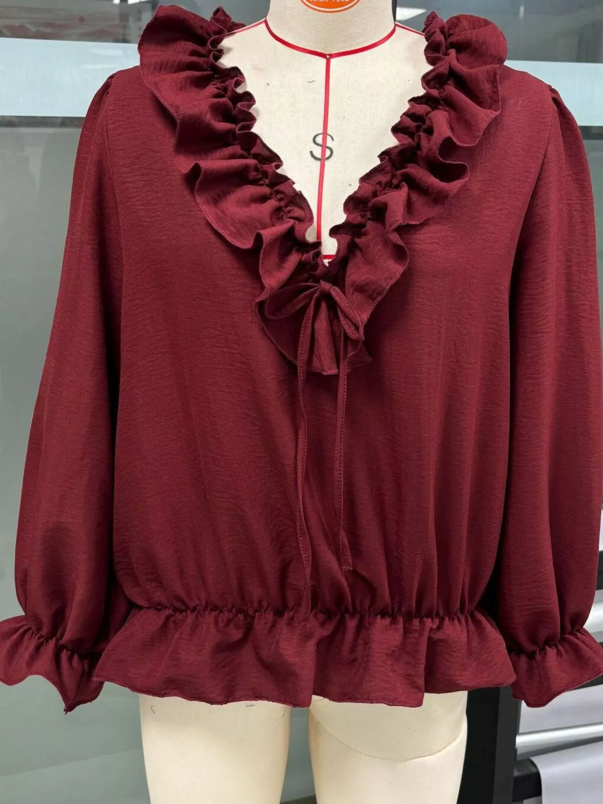 V-ringad blus – bild 10