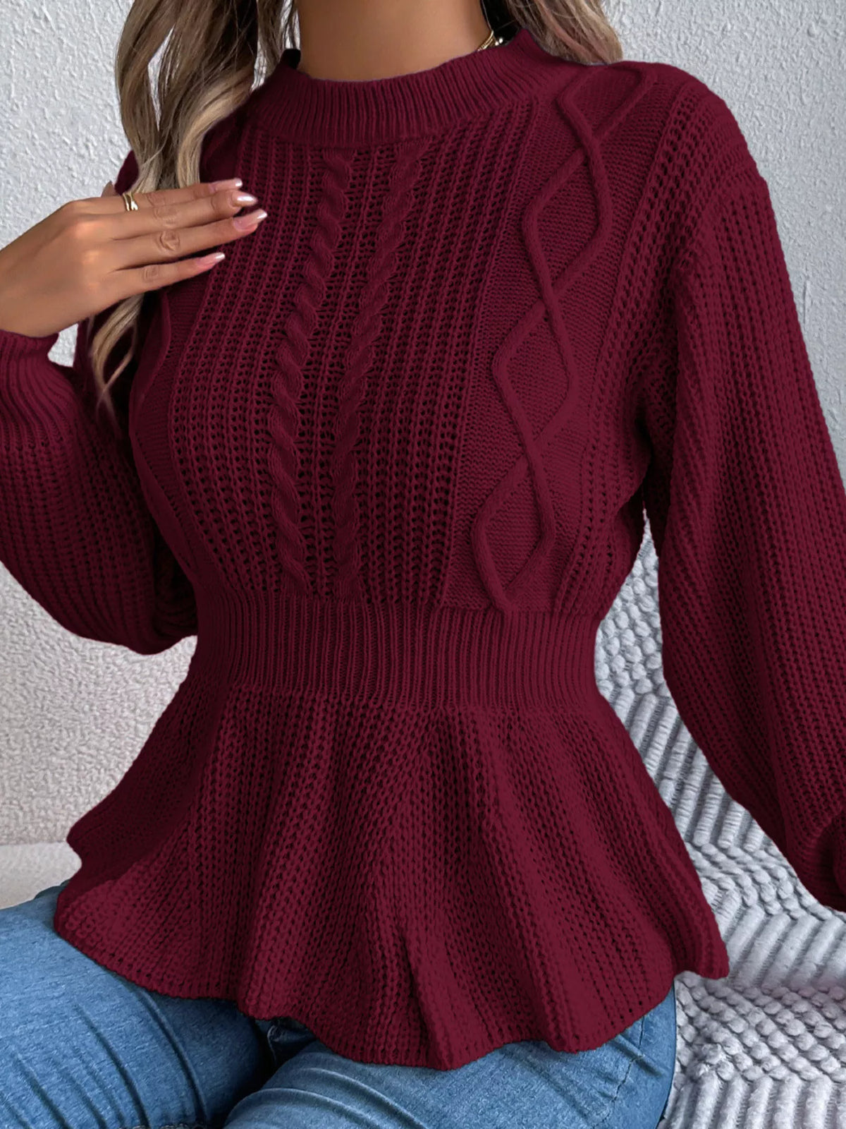 Kabelstickad tröja med peplum – bild 16