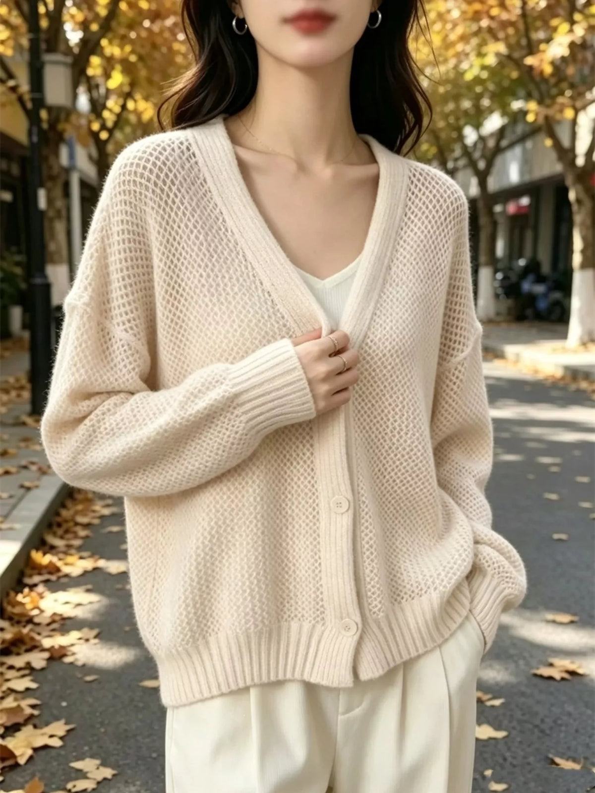 Hålstickad cardigan – bild 9