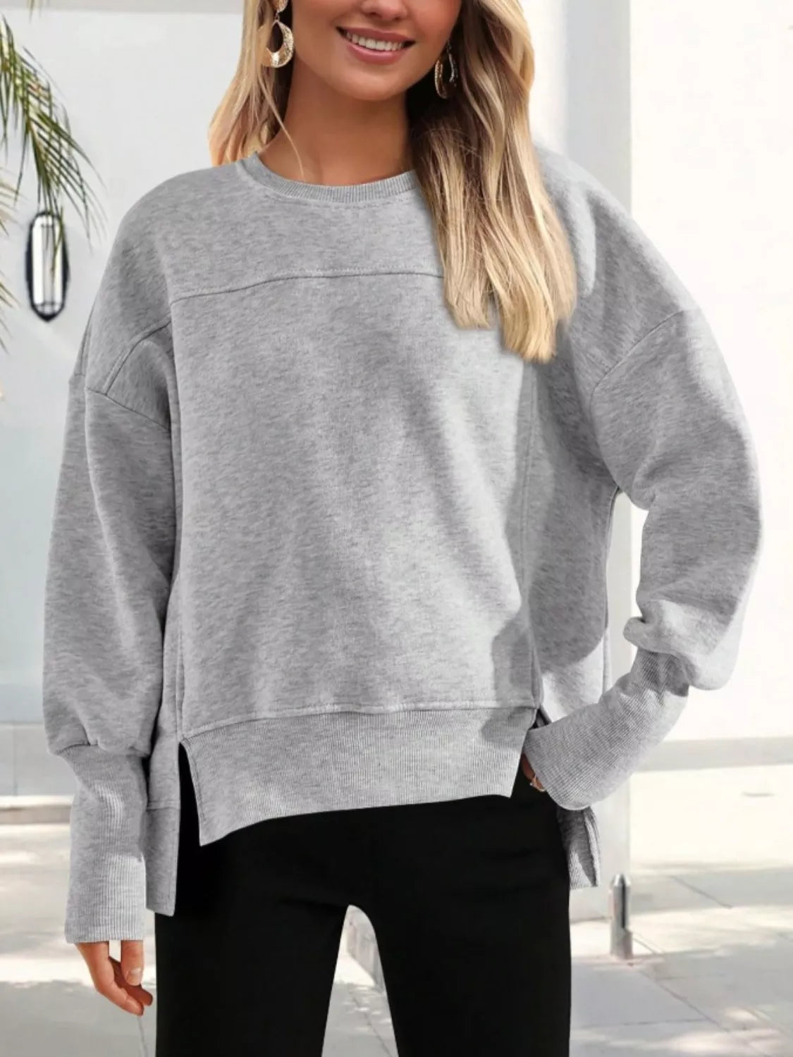 Ledigt sittande sweatshirt med slits – bild 6