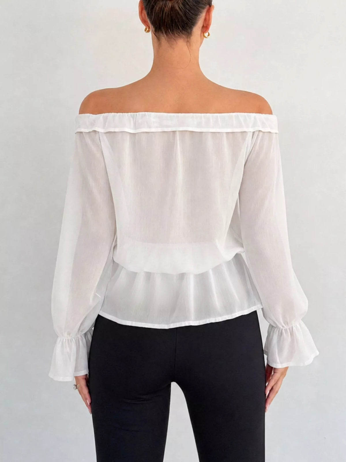 Blus i chiffong med peplum – bild 10