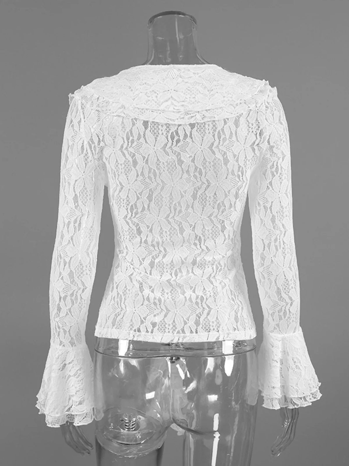V-ringad blus i spets – bild 9