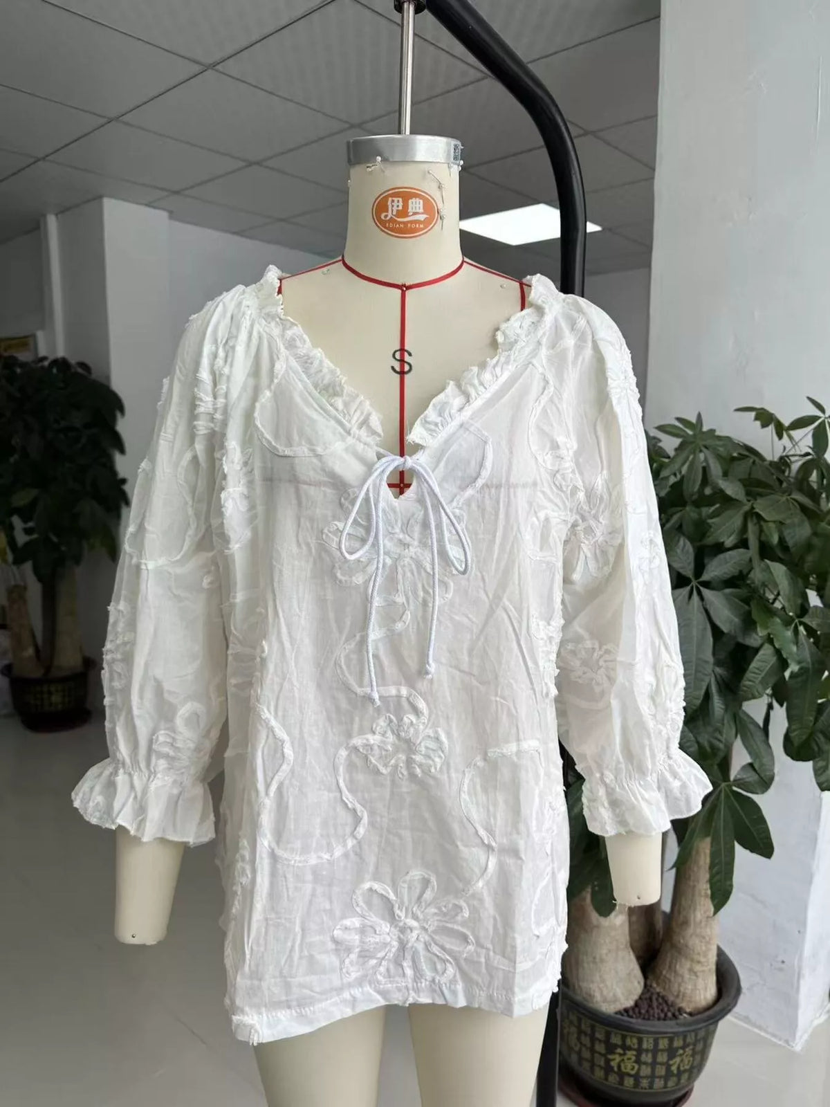 Blommig blus med snörning – bild 6