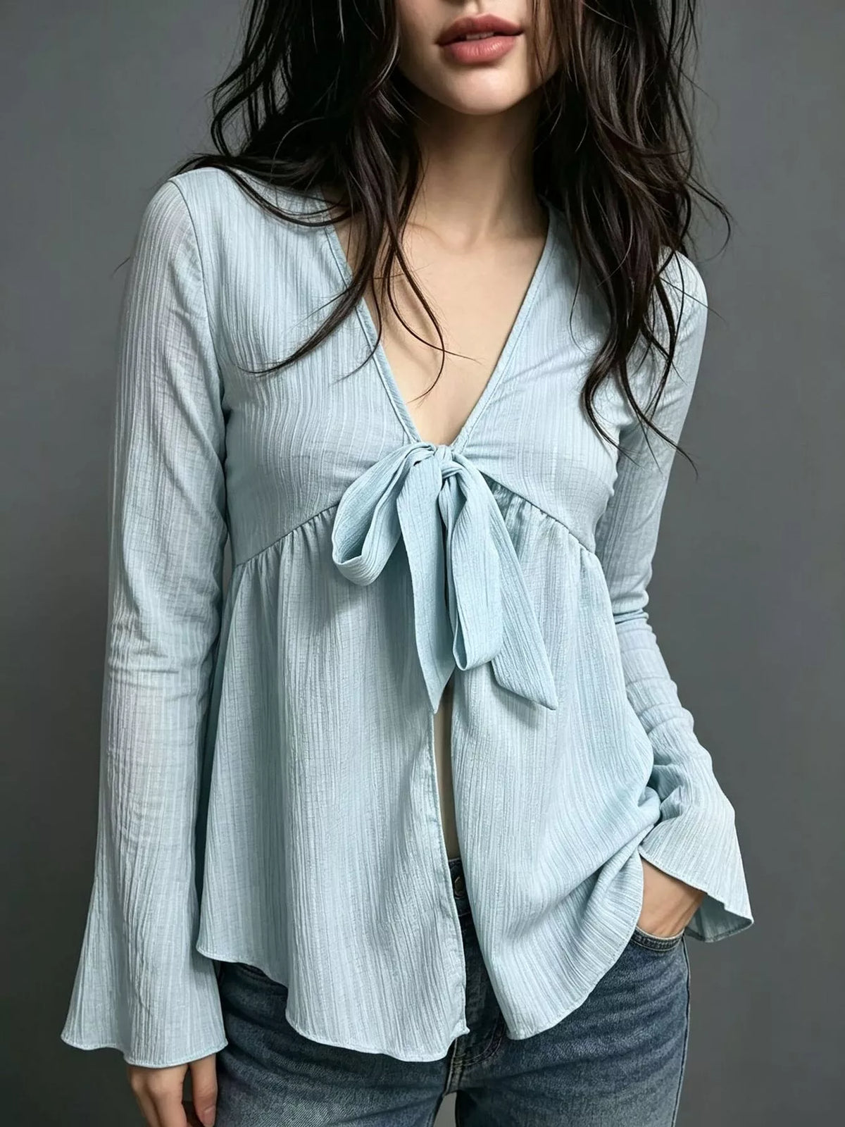 Blus med utsvängd ärm och babydoll-modell – bild 4