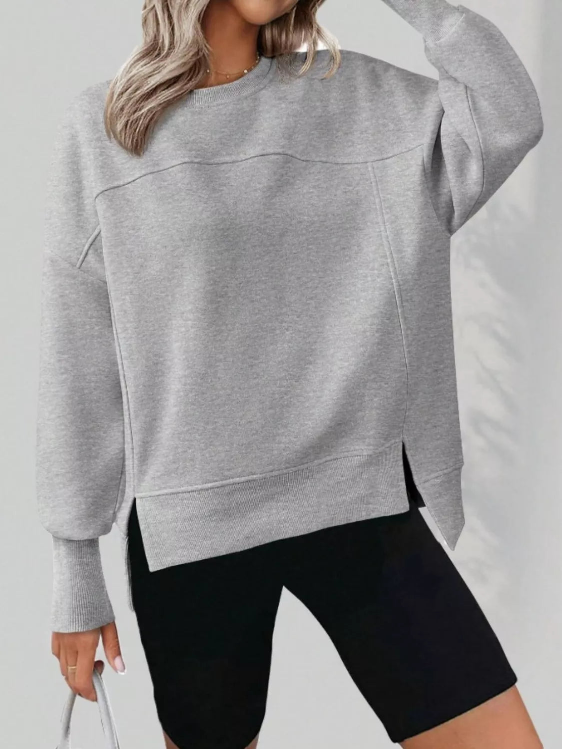 Ledigt sittande sweatshirt med slits – bild 10