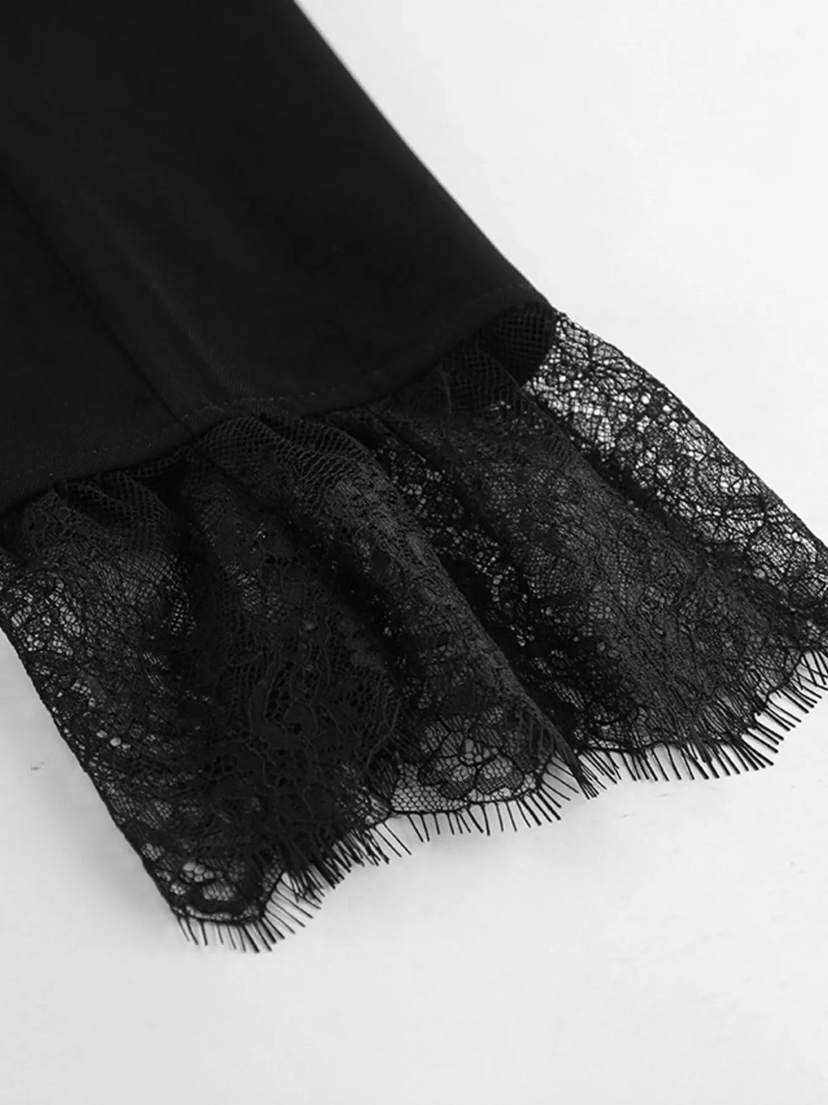 Blazer med spetskant i nederkant och knappstängning – bild 14