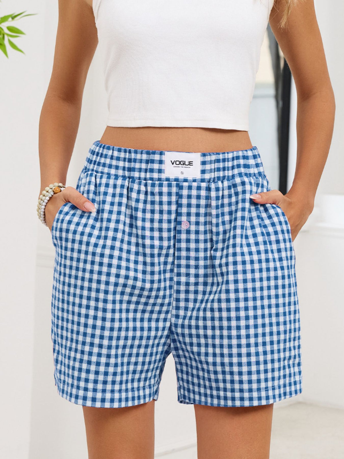 Rutiga shorts med resårmidja – bild 9