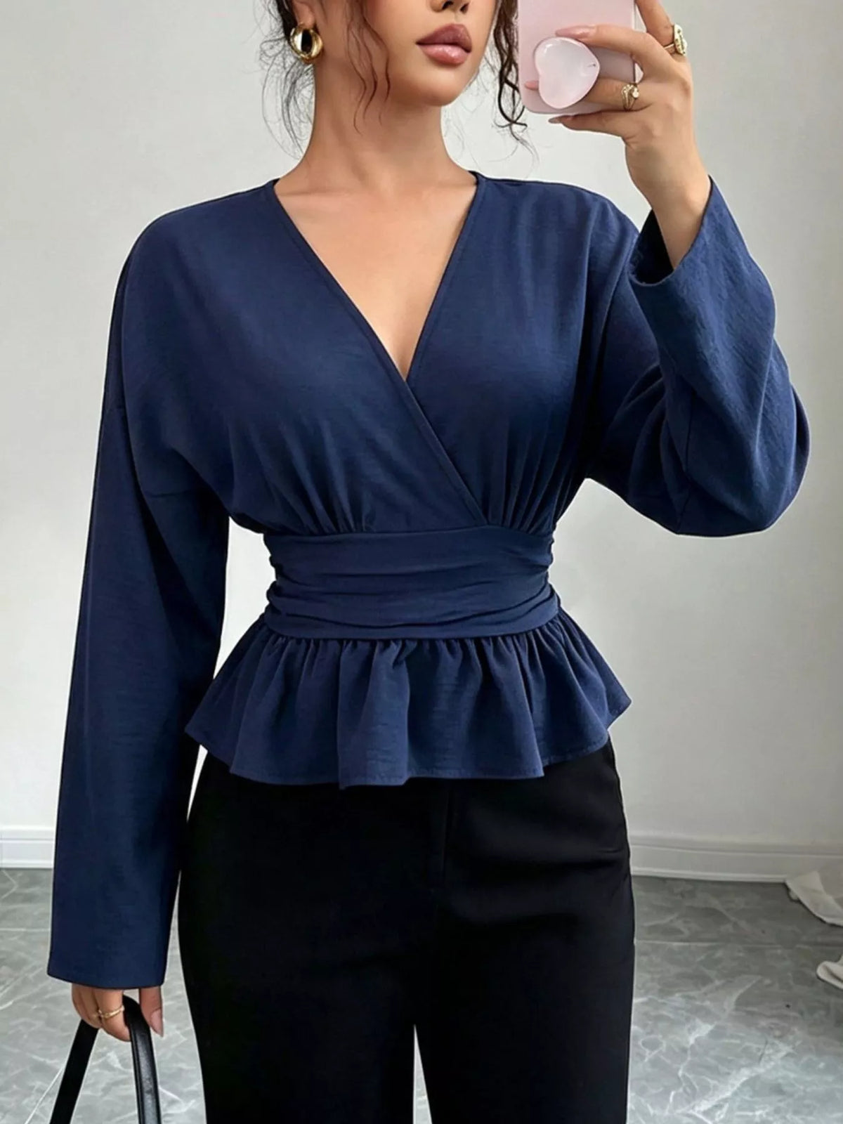 Blus med omlott och peplum – bild 2