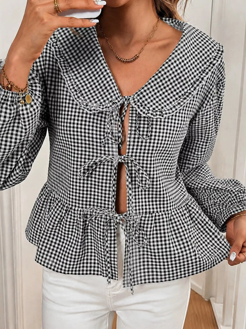 Rutig blus med peplum