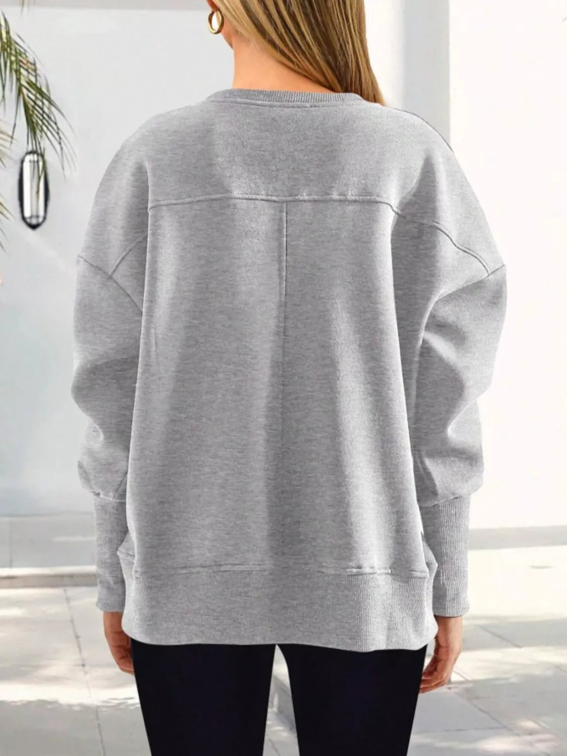 Ledigt sittande sweatshirt med slits – bild 9