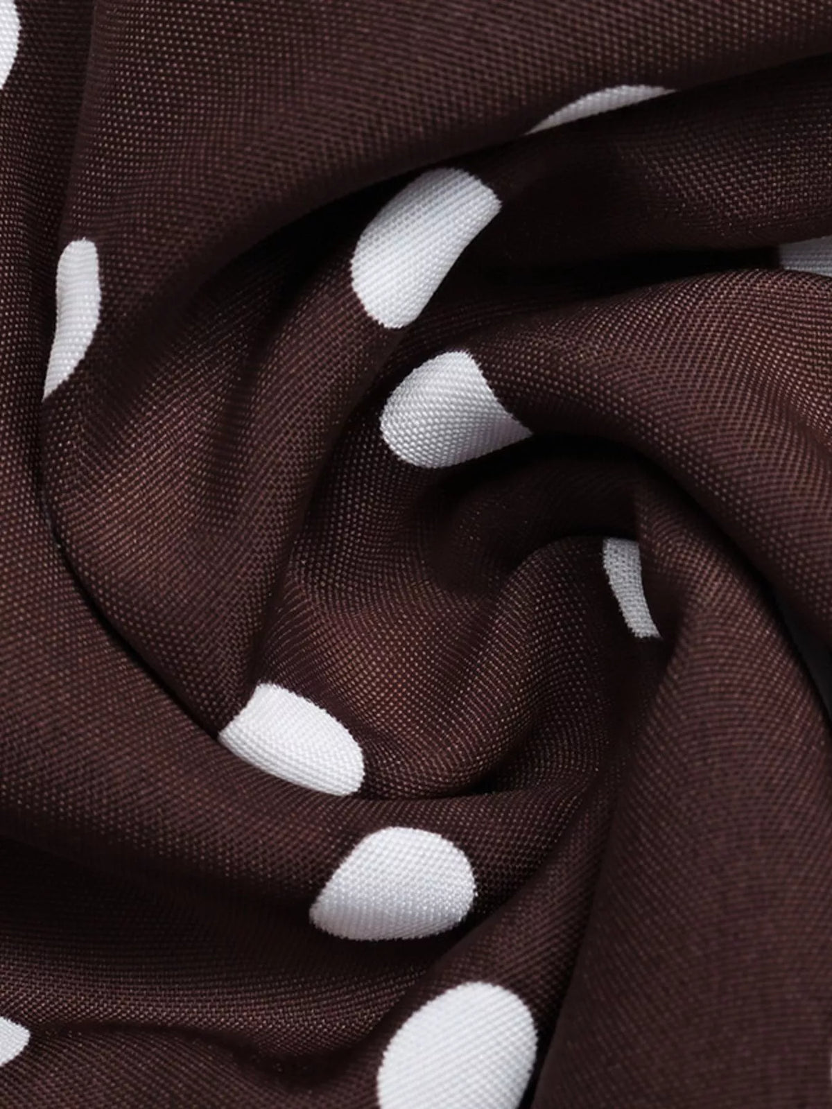 Prickig miniklänning med halterneck och knytdetalj i polyester – bild 19