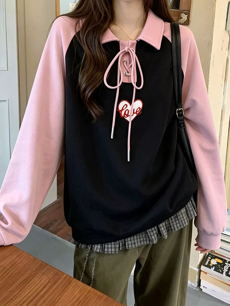 Sweatshirt i spets med hjärtmotiv