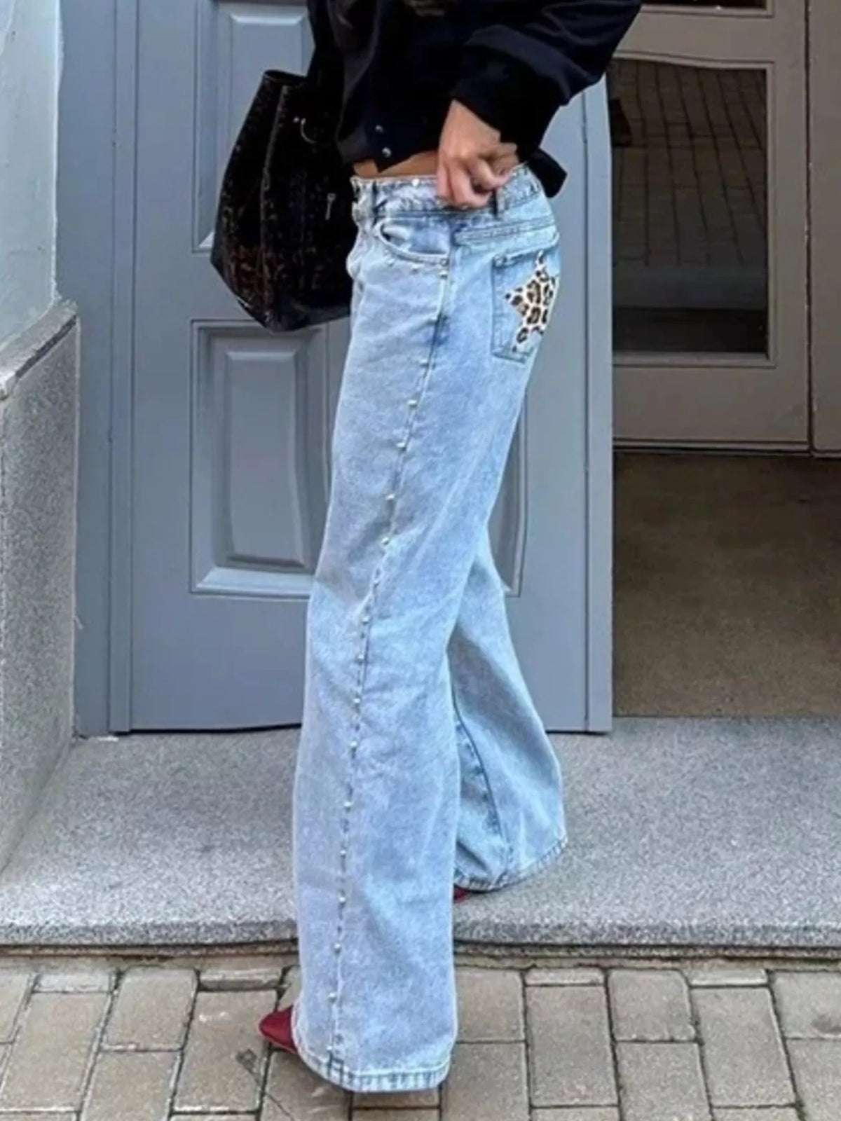 Leopardmönstrade jeans med stjärnmotiv – bild 10