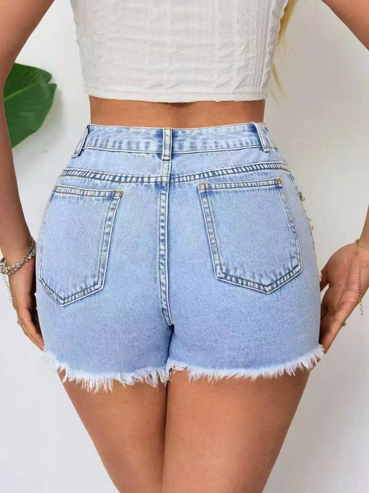 Shorts i denim med rå kant – bild 4