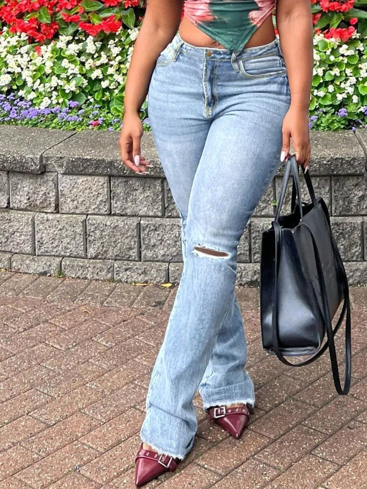 Utsvängda jeans med revor – bild 2