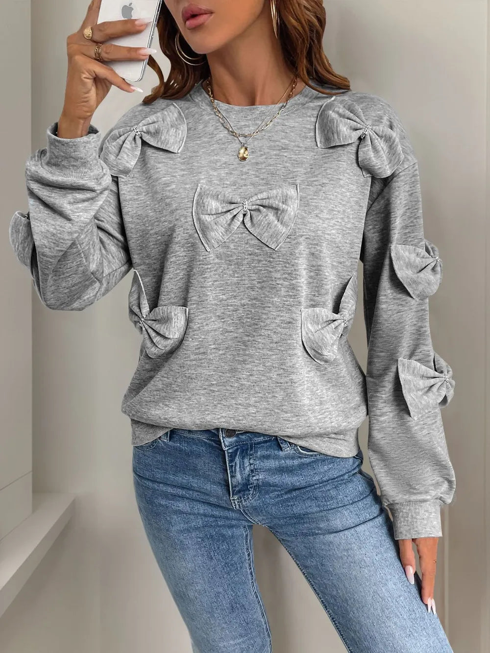 Långärmad sweatshirt med rund halsringning och rosett – bild 4