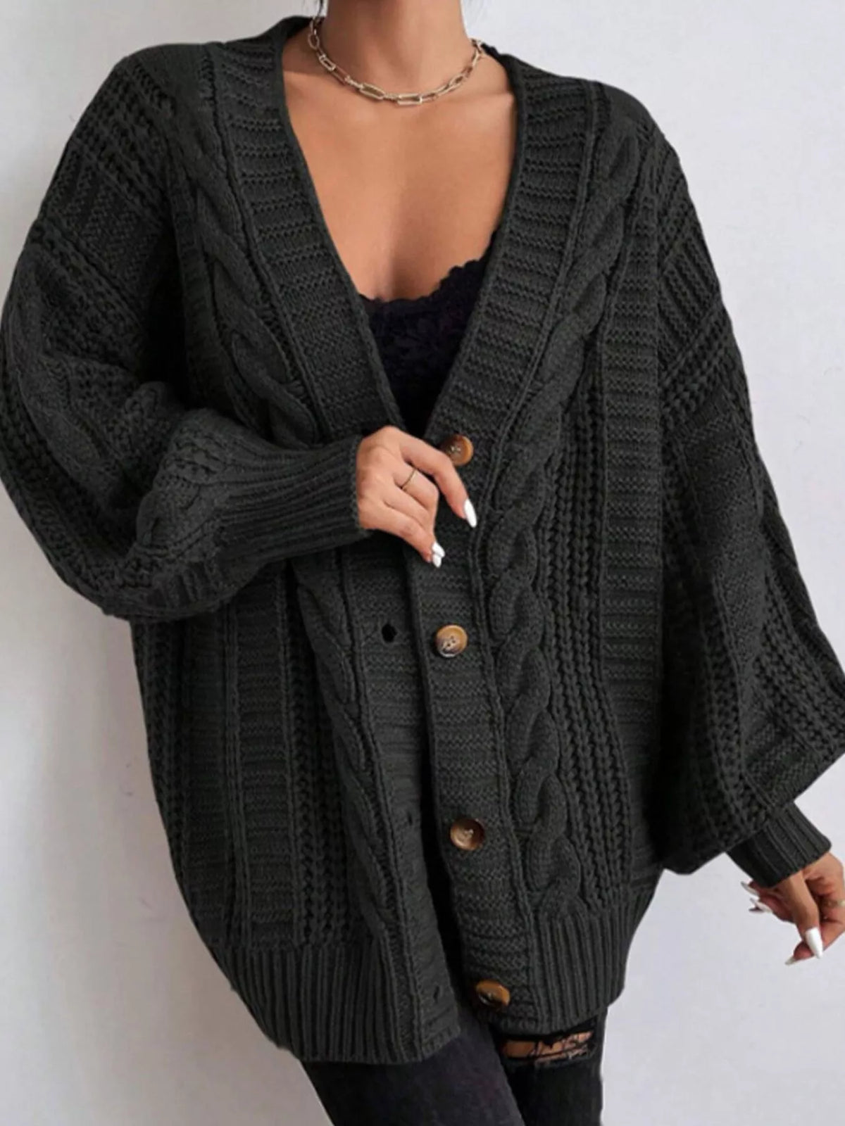 Kabelstickad oversize cardigan – bild 4