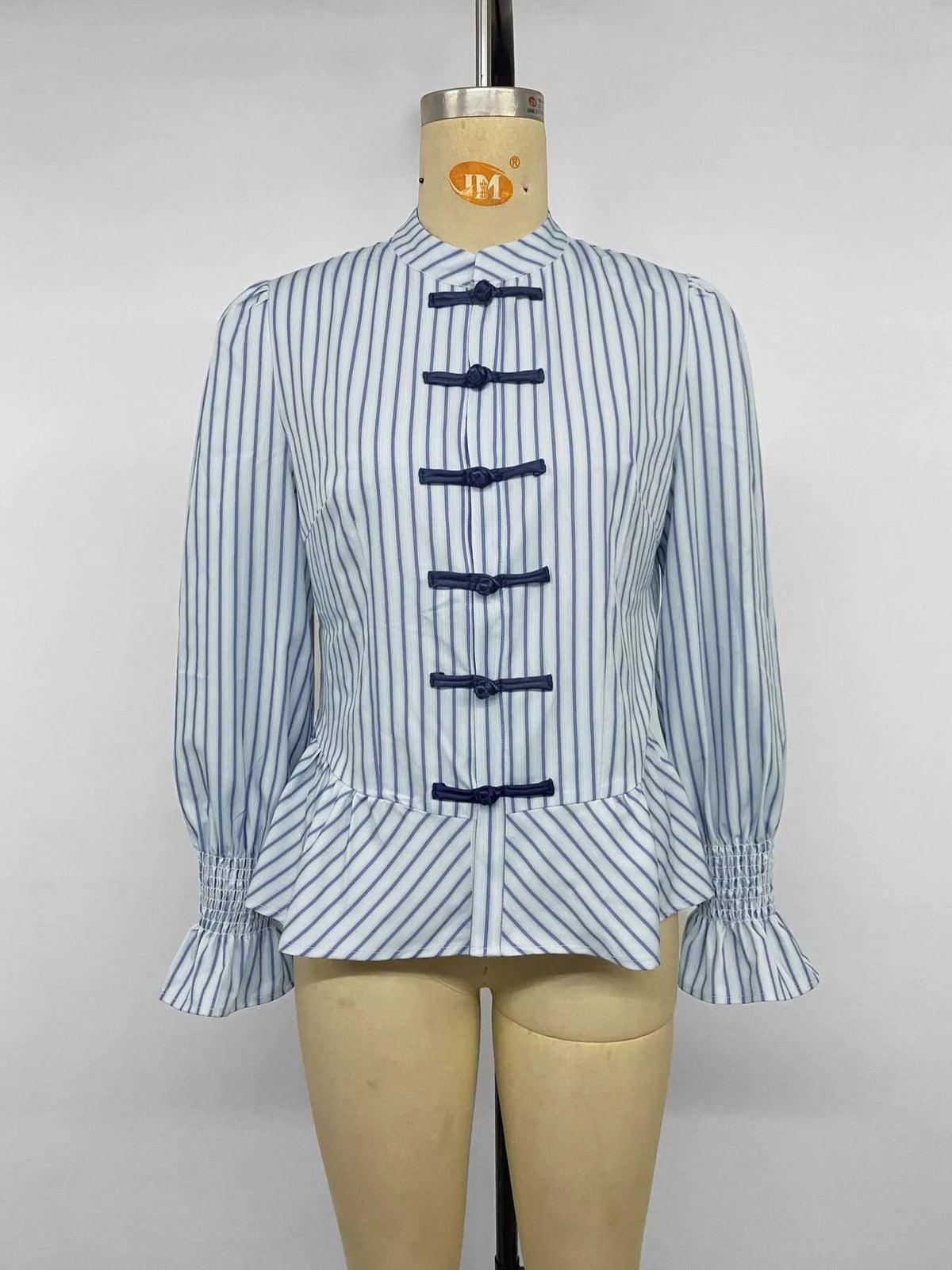 Randig smockad skjorta med peplum – bild 13