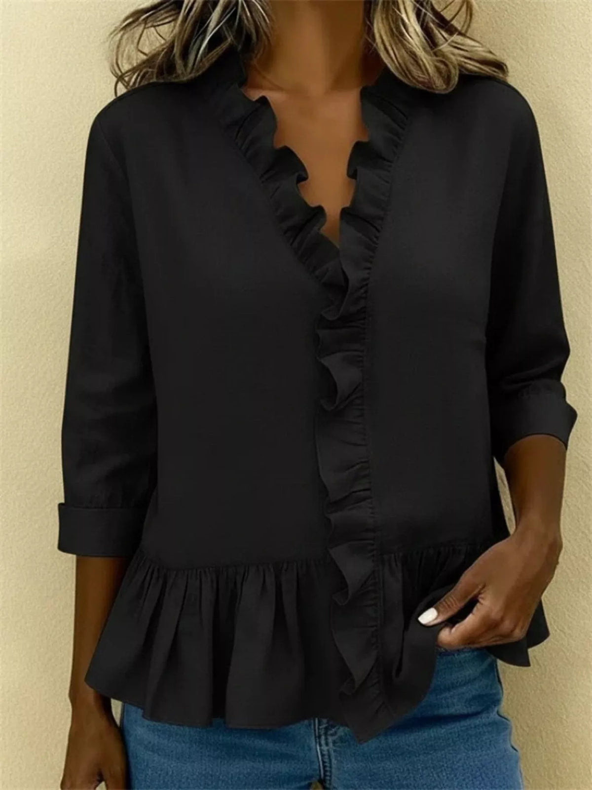 V-ringad blus med peplum – bild 11