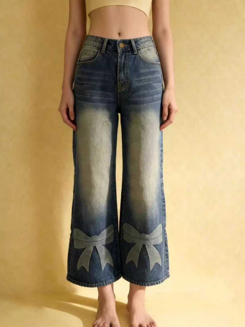 Vida jeans med knappstängning och rosett