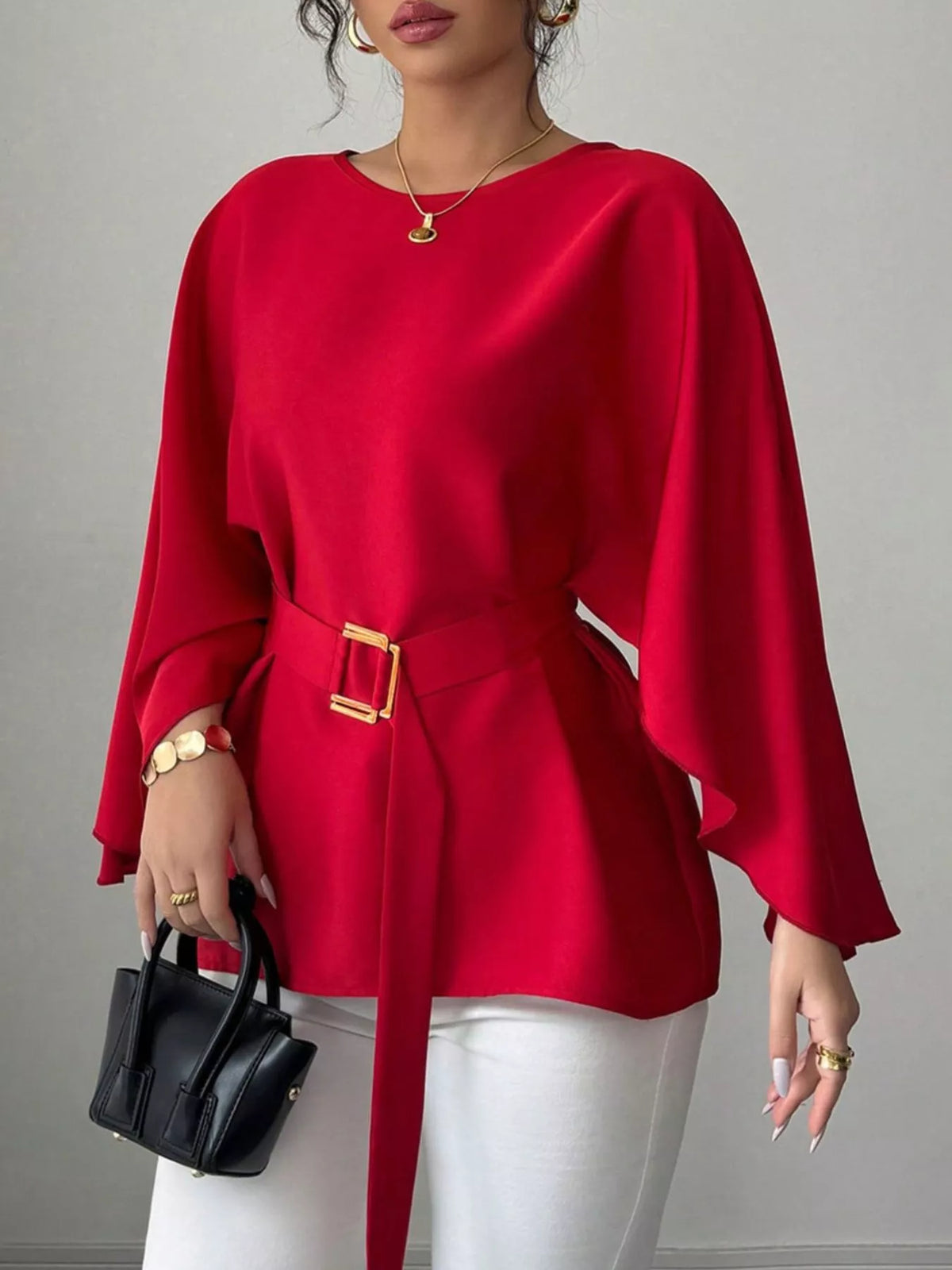 Blus med rund halsringning och fladdermusärm – bild 3