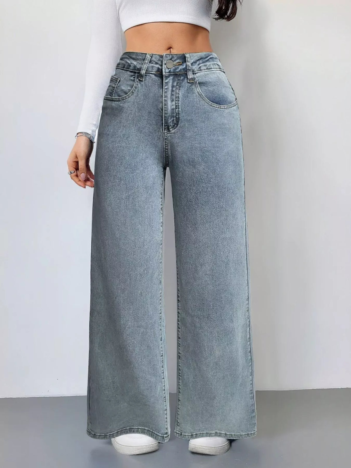 Vida jeans med hög midja och midjedetalj