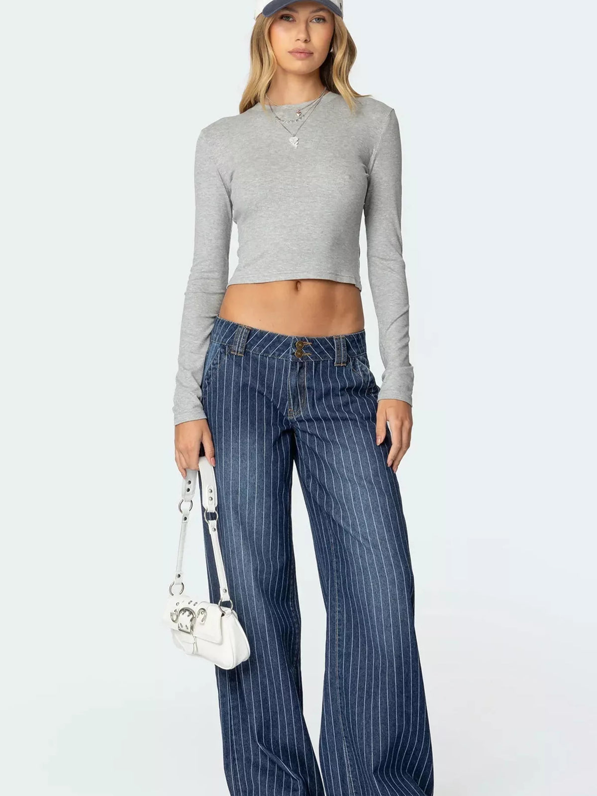 Randiga vida jeans med knappstängning – bild 4
