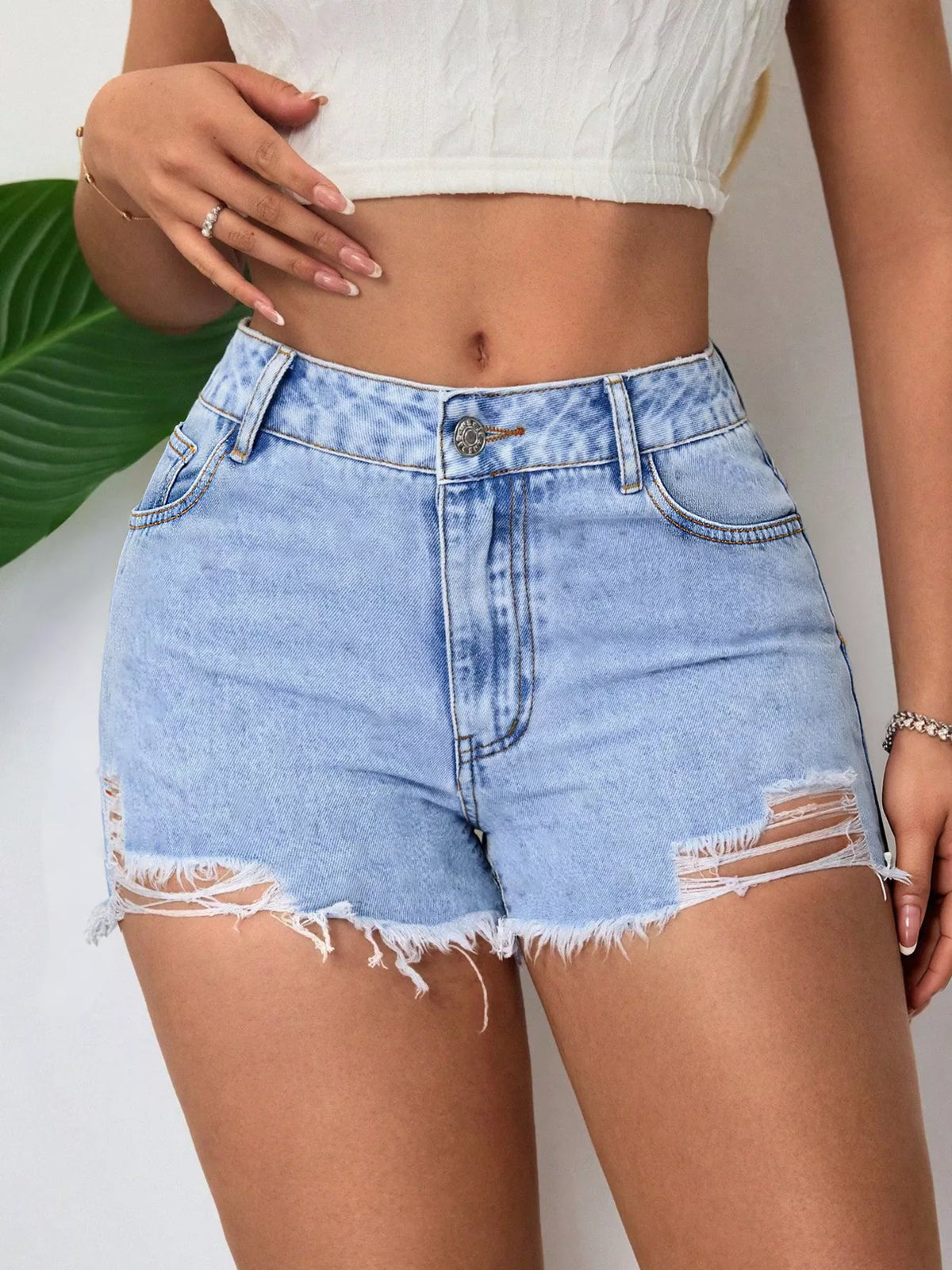 Shorts i denim med rå kant – bild 2