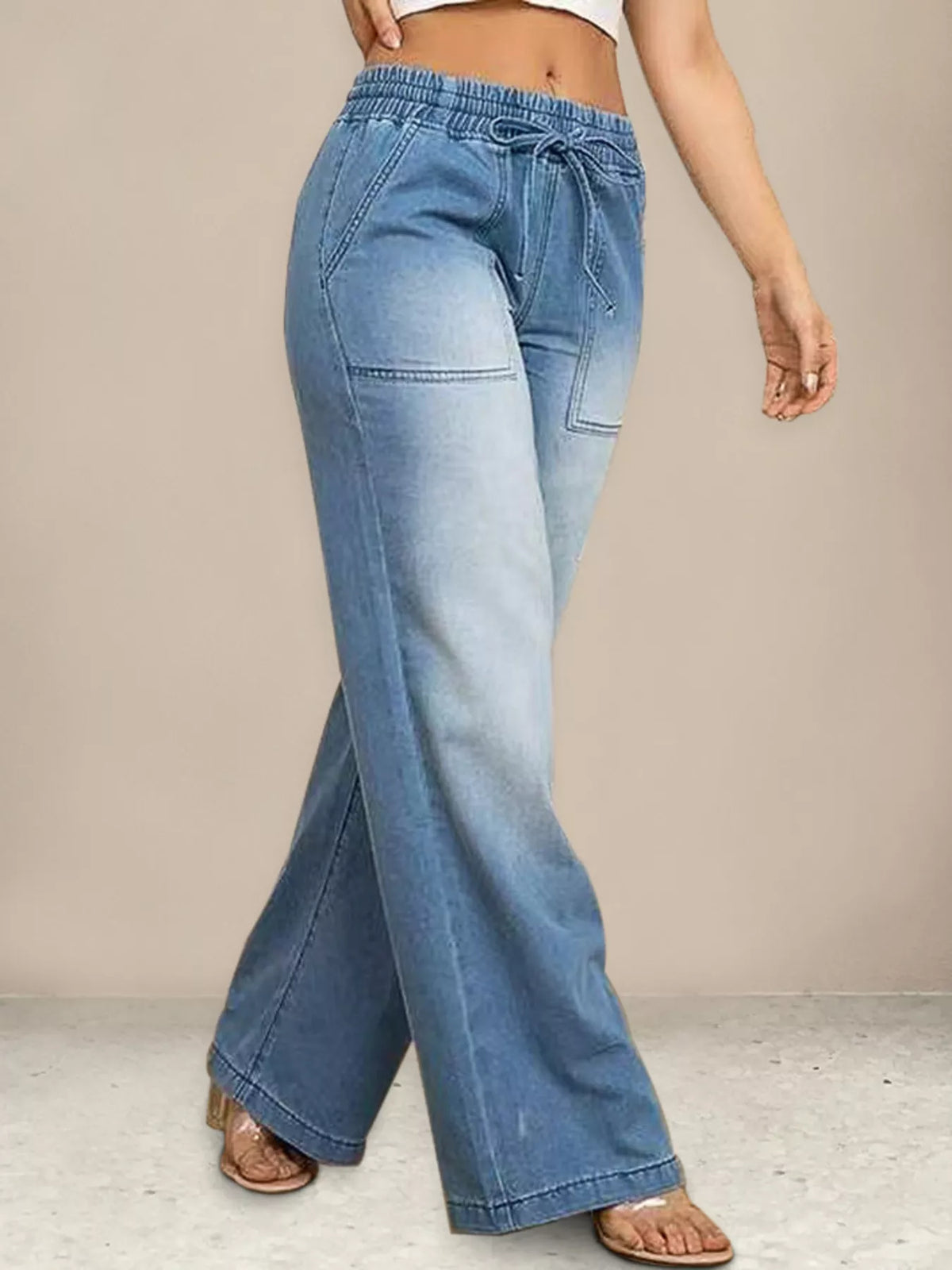 Vida jeans med dragsko och fickor – bild 7
