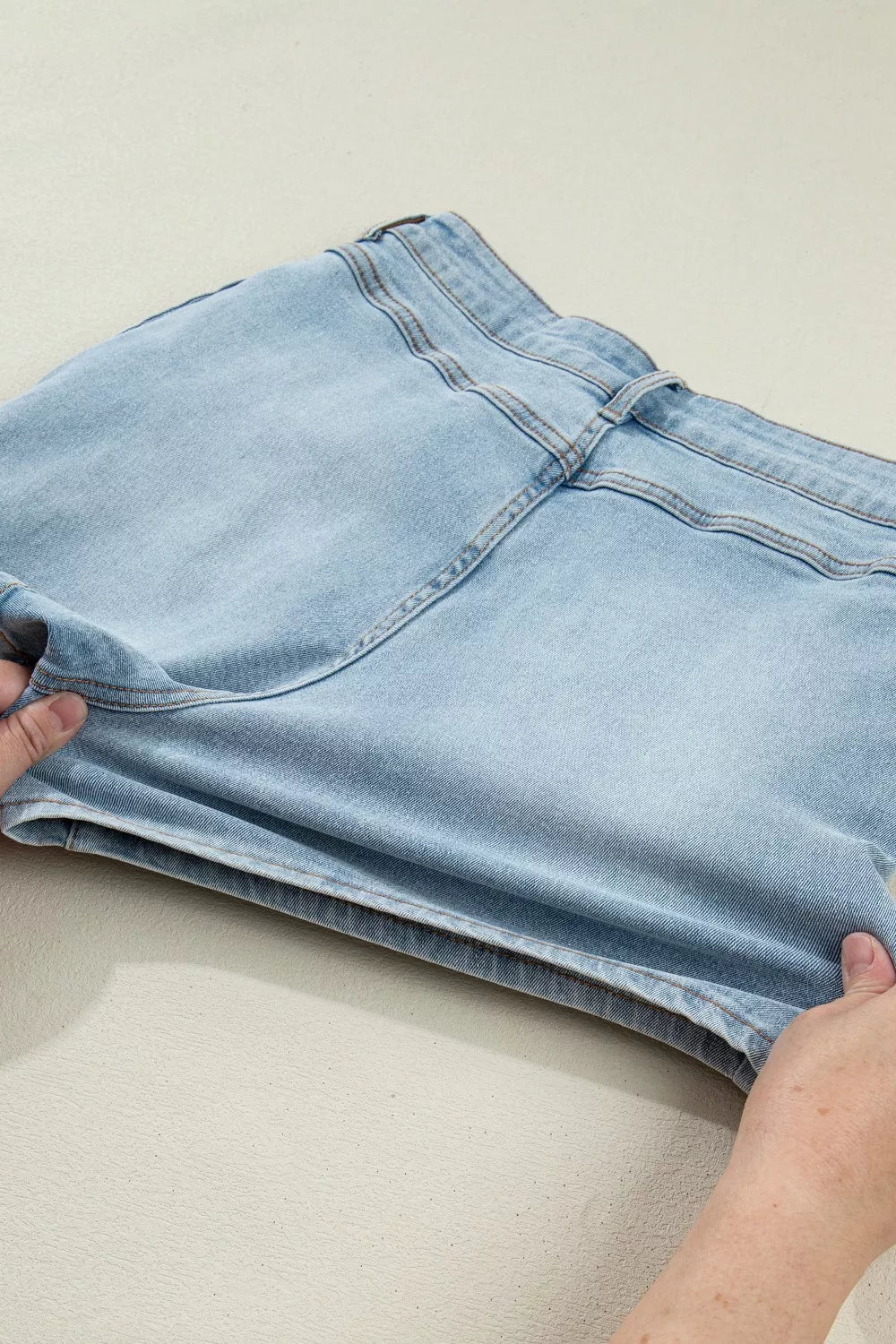 Shorts i denim med rosett – bild 9