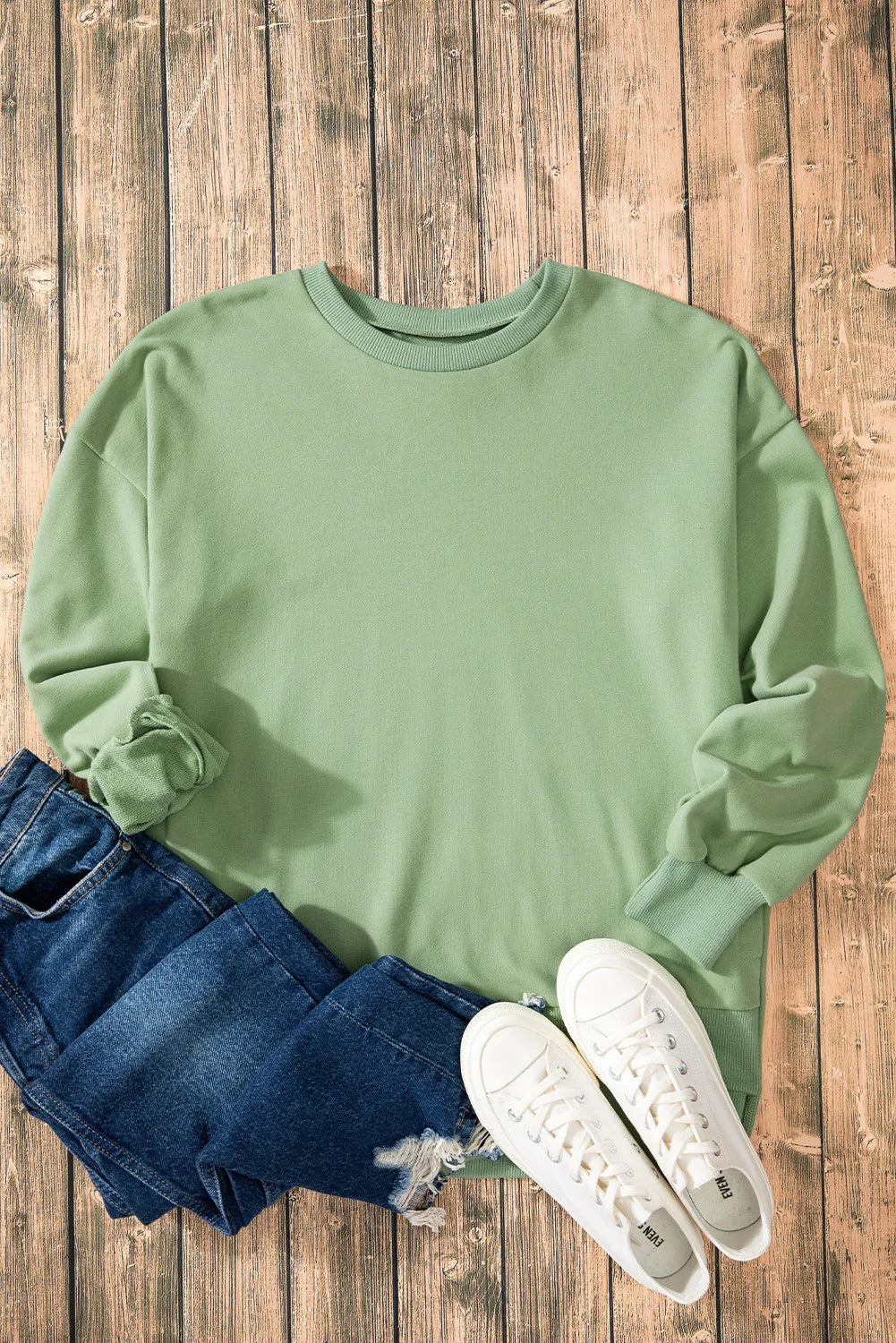 Långärmad sweatshirt med rund halsringning och asymmetrisk nederkant – bild 11